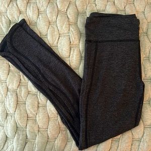 Free People Movement Leggings. Dark Grey, cut outs on leg. Great condition. XS
